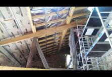 Aménagement construction métallique et pose laine de verre GR32 en 100mm  