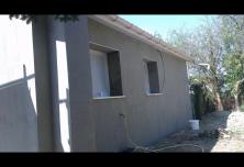 Application de deuxième couche d'enduit 